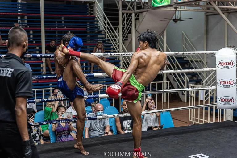 Thai Boxing Fight at Bangla Stadium During Night Time