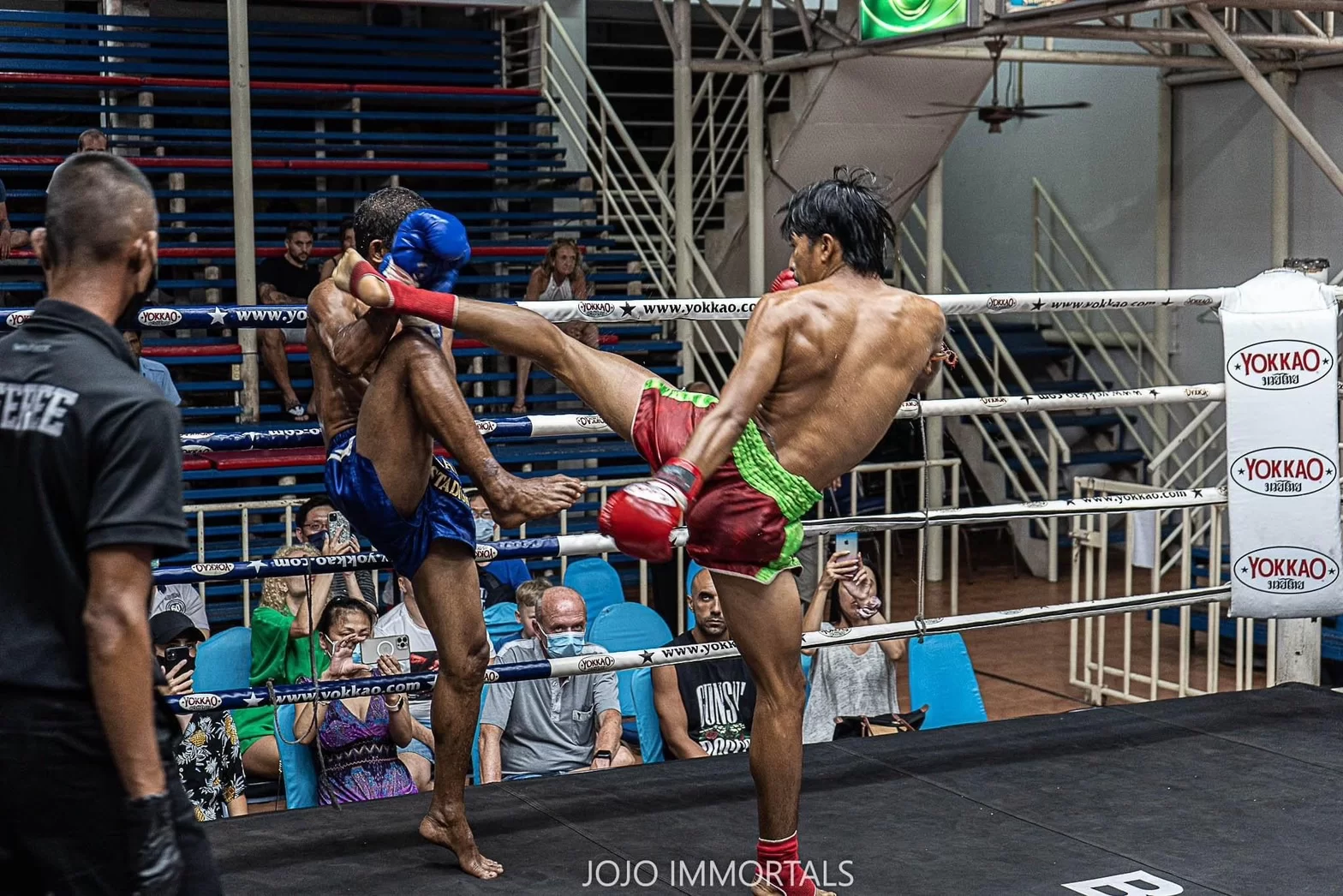 Thai Boxing Fight at Bangla Stadium During Night Time