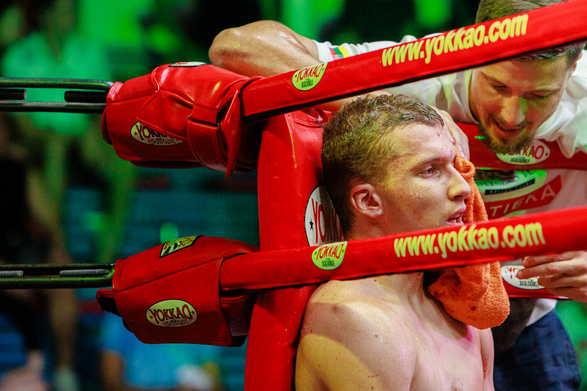 A boxer in a ring, ready to fight.