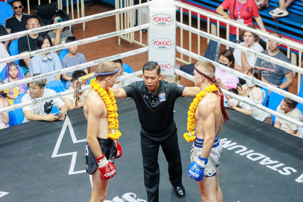 Two men ready to fight in a boxing match