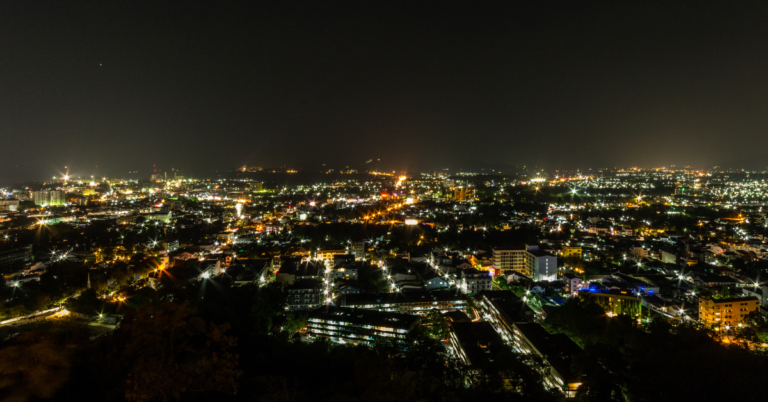 A breathtaking view of Phuket city lights at night, showcasing the bustling cityscape and illuminated skyline.