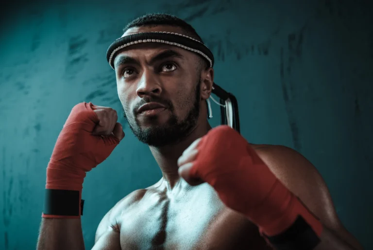 martial artist boxing pose red wraps